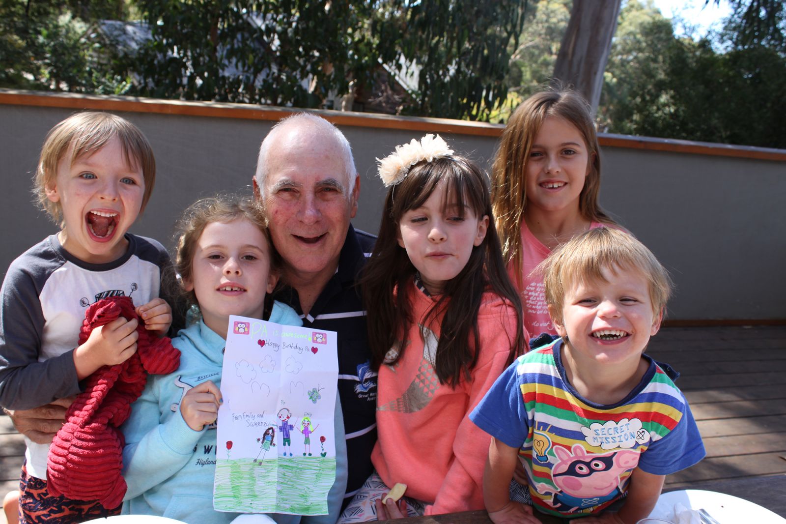 John in Retirement with grandchildren